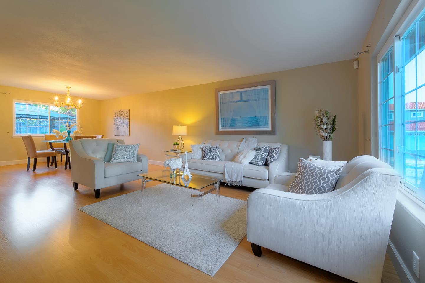 664 New Compton Drive San Jose, CA 95136 - Photo 13 of 26 a living room with furniture and a large window