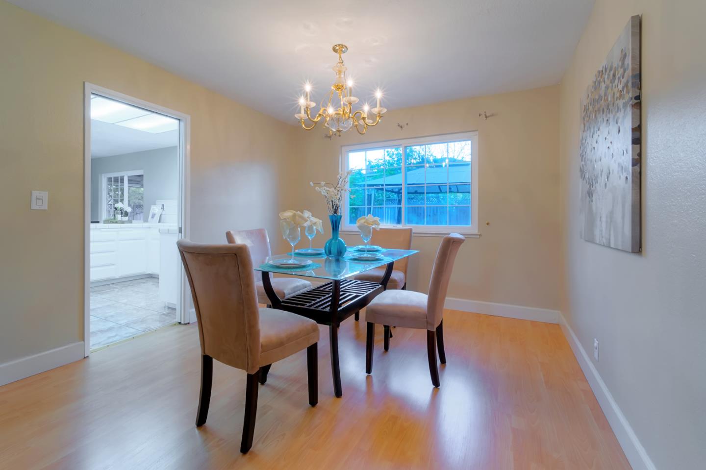 664 New Compton Drive San Jose, CA 95136 - Photo 14 of 26 a view of a dining room with furniture and chandelier