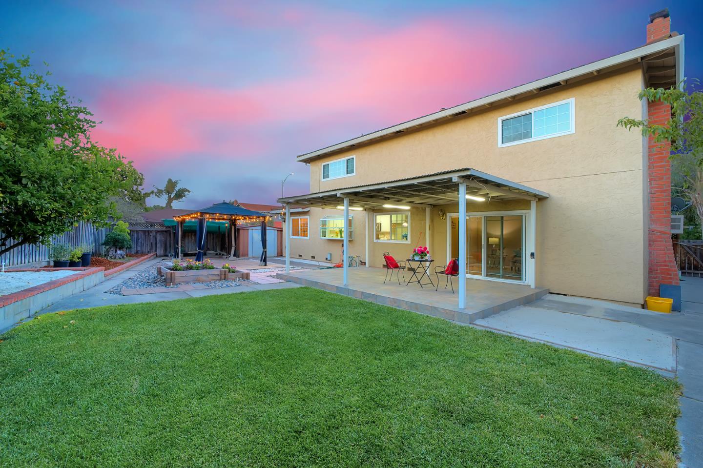 664 New Compton Drive San Jose, CA 95136 - Photo 25 of 26 a view of a house with backyard and sitting area