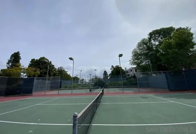 a view of a backyard with sitting area