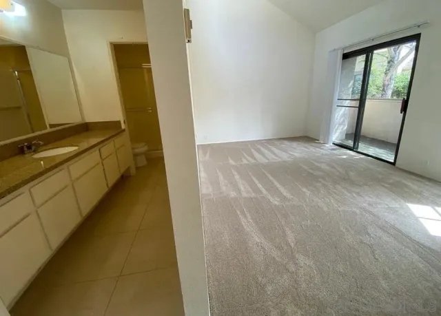 a view of a hallway with storage