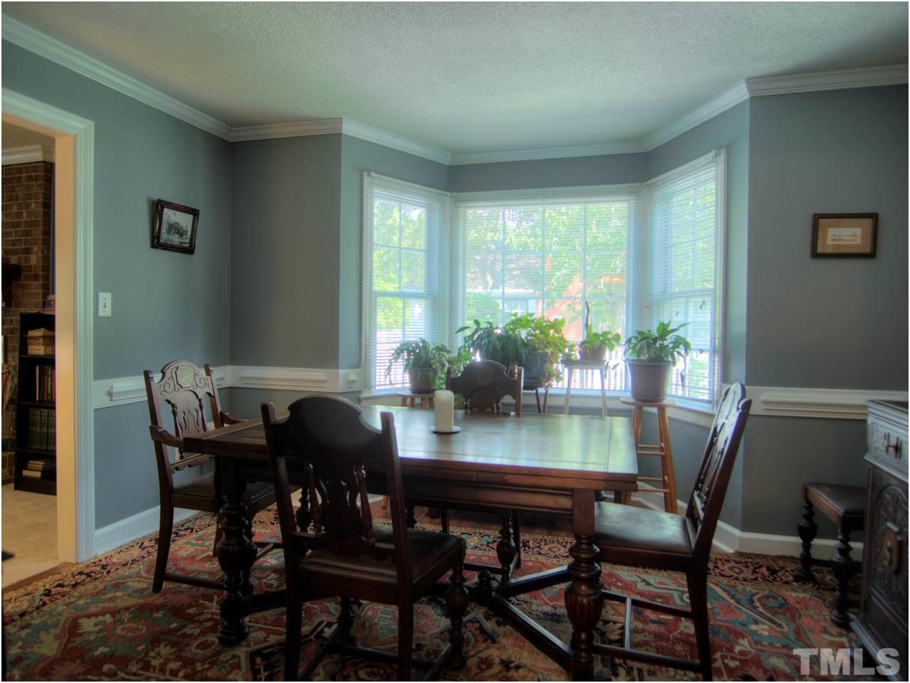 2016 Travianna Court Raleigh, NC 27609 - Photo 8 of 19 a view of a dining room with furniture and window