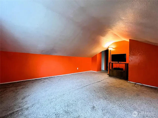 a view of an empty room with a room