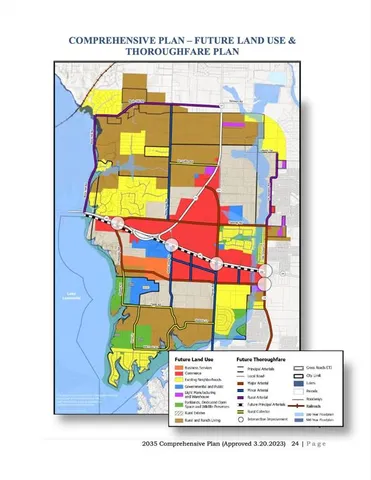 a view of a swimming pool with sitting area