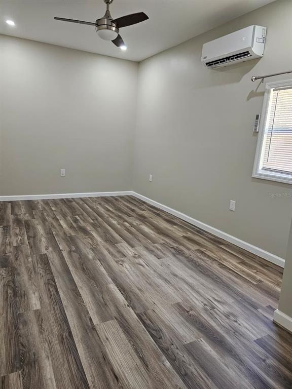 20805 Sheldon Street Orlando, FL 32833 - Photo 8 of 18 a view of a room with rack on the wall and a window