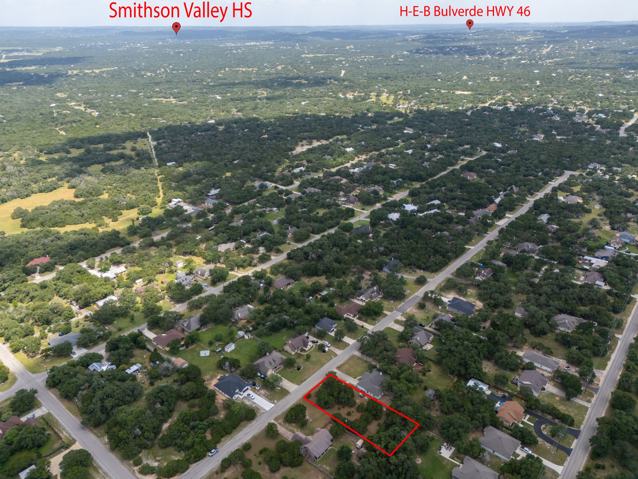 1170 Misty Lane Spring Branch, TX 78070 - Photo 1 of 24 An aerial perspective showcases a spacious lot amidst a verdant residential area, offering serene surroundings.