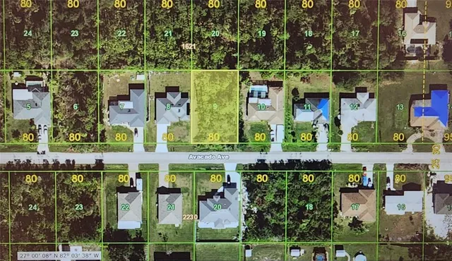 a group of people sitting in front of retail shop