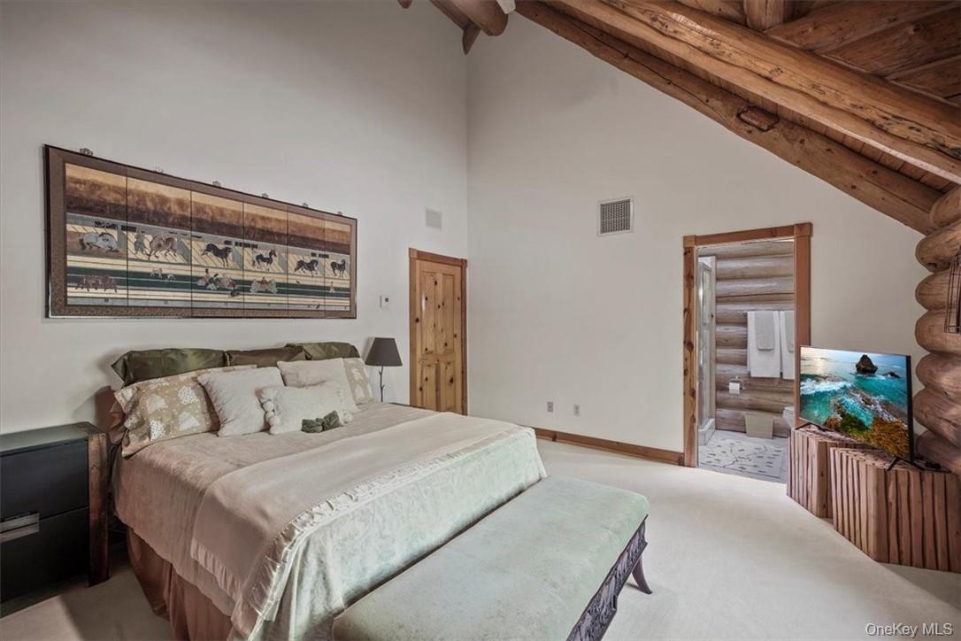 101 Mountain Lodge Road Washingtonville, NY 10992 - Photo 16 of 26 a bedroom with furniture and a book shelf