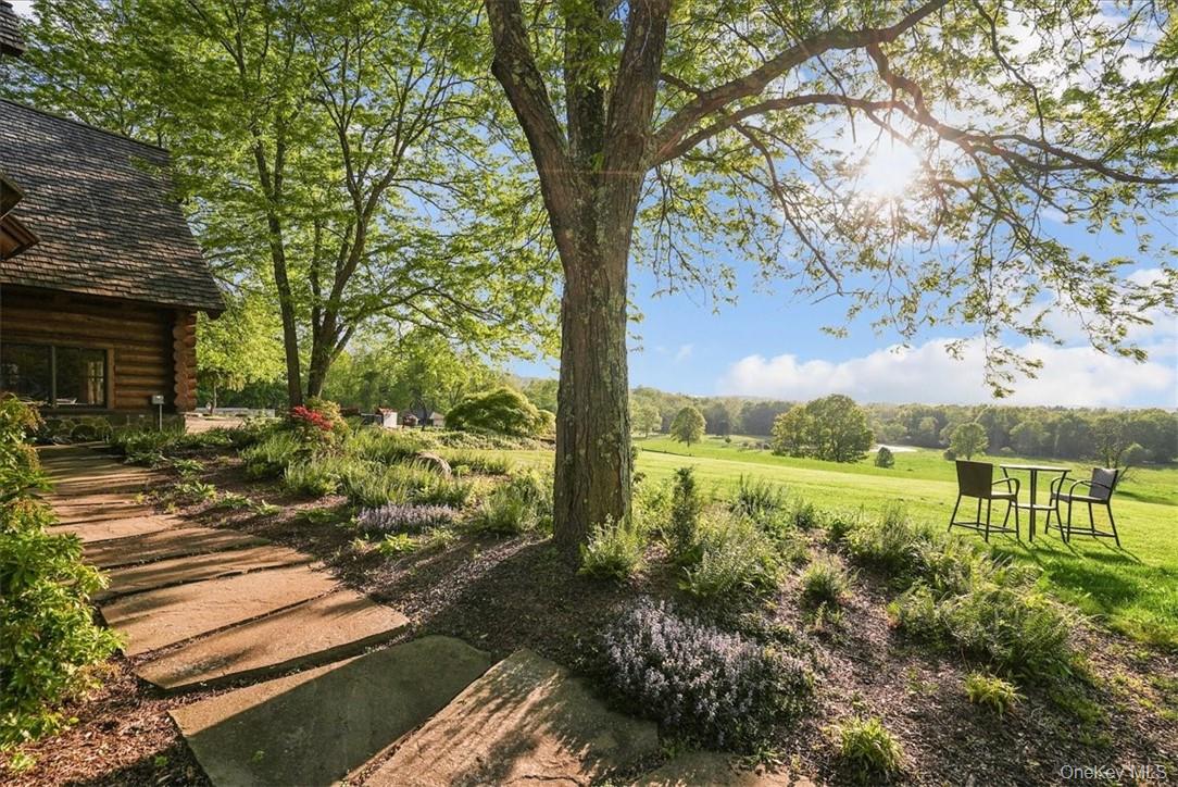101 Mountain Lodge Road Washingtonville, NY 10992 - Photo 21 of 26 a view of a garden with a large tree