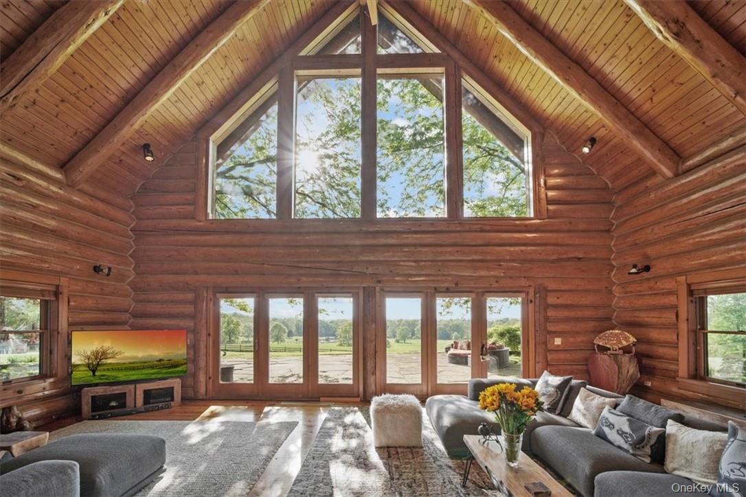 101 Mountain Lodge Road Washingtonville, NY 10992 - Photo 6 of 26 a living room with furniture and a flat screen tv