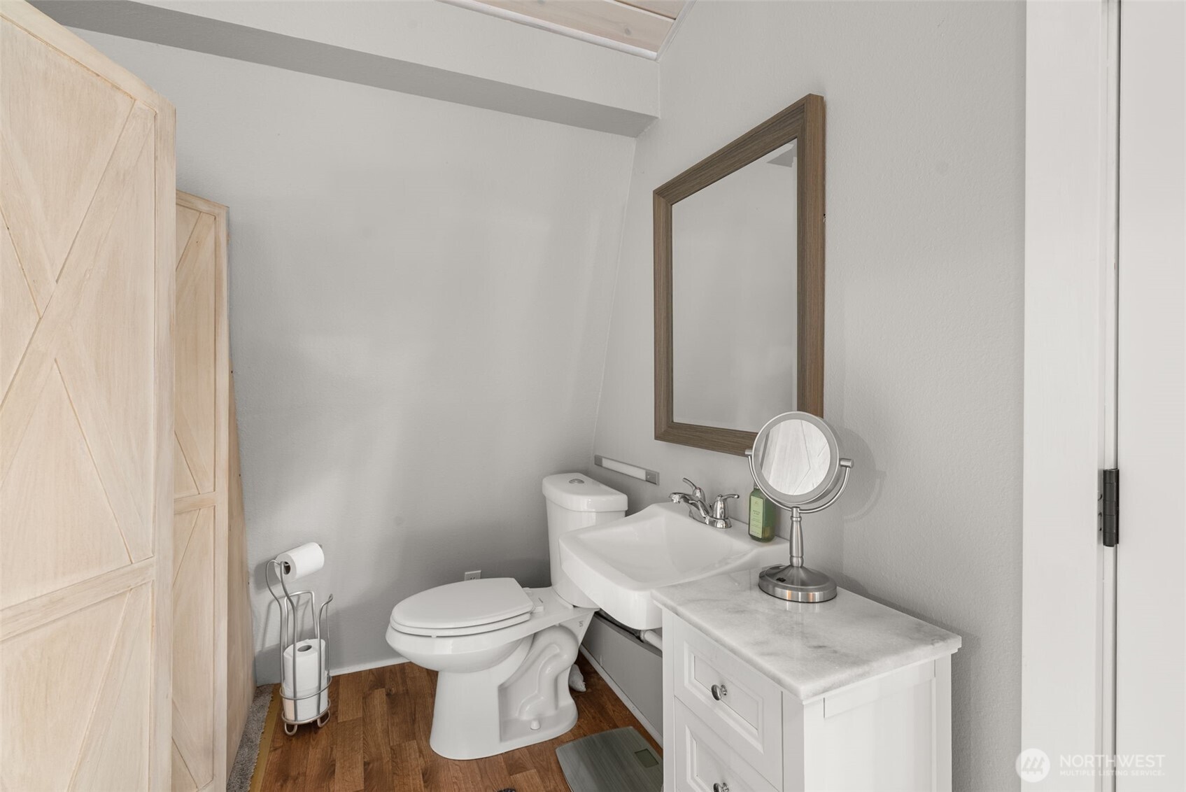 2800 East Phillips Lake Loop Road Shelton, WA 98584 - Photo 15 of 40 a bathroom with a sink toilet and a mirror