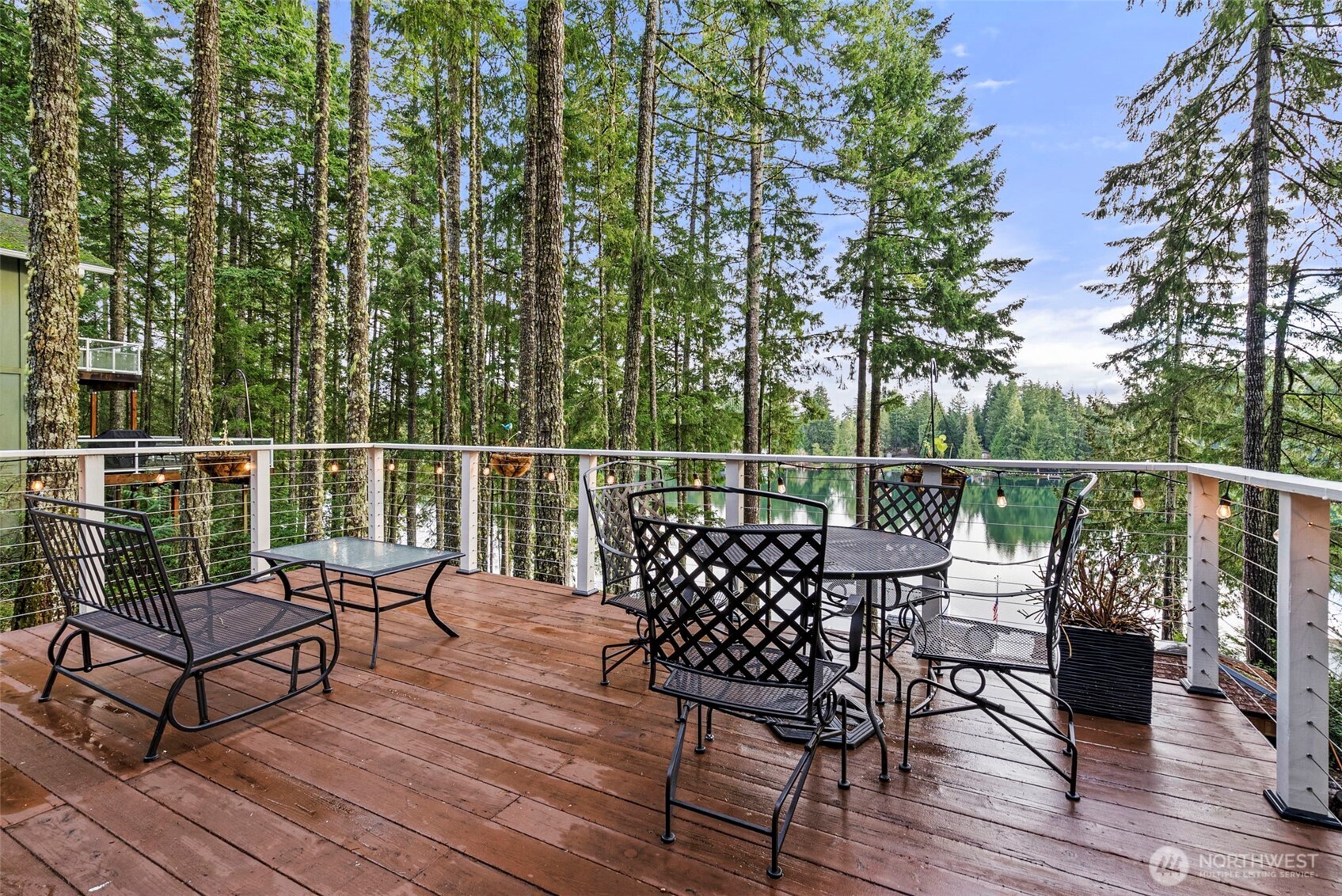 2800 East Phillips Lake Loop Road Shelton, WA 98584 - Photo 22 of 40 a view of a chairs on deck