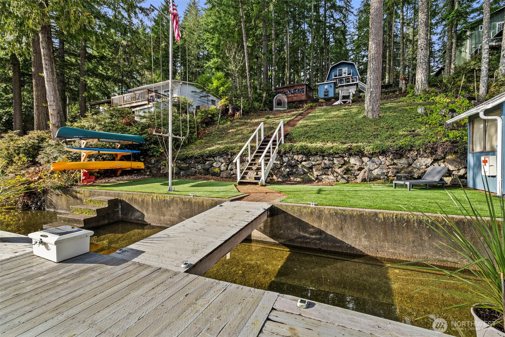 2800 East Phillips Lake Loop Road Shelton, WA 98584 - Photo 31 of 40 a view of yard with swimming pool and outdoor seating
