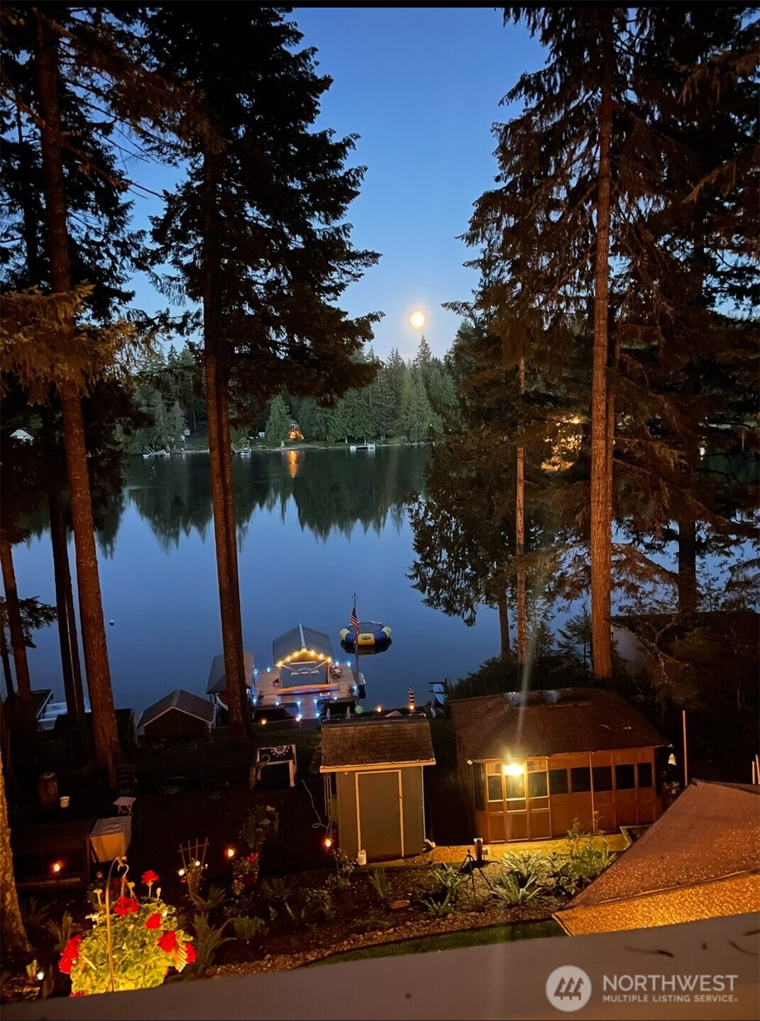 2800 East Phillips Lake Loop Road Shelton, WA 98584 - Photo 40 of 40 a front view of a house with a yard and fountain in middle