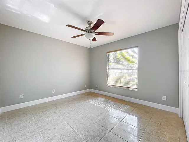 a view of a livingroom with furniture and a flat screen tv