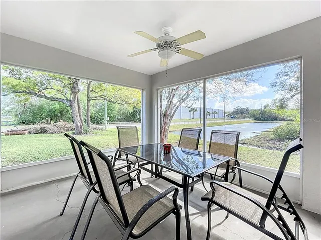 an aerial view of houses with yard