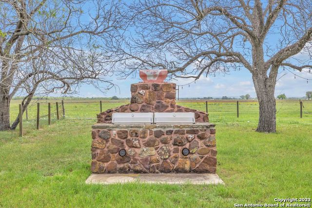 16547 East Gable Road St. Hedwig, TX 78152 - Photo 14 of 38 a view of a yard with an trees