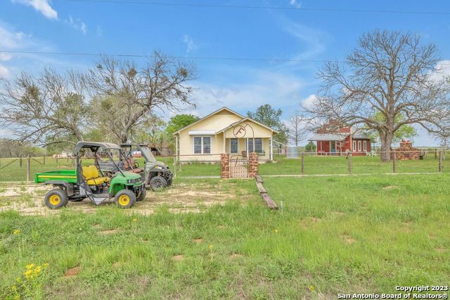16547 East Gable Road St. Hedwig, TX 78152 - Photo 34 of 38 a view of a house with backyard and sitting area