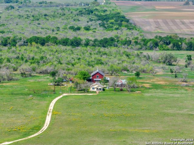 16547 East Gable Road St. Hedwig, TX 78152 - Photo 37 of 38 a view of a garden with a swimming pool
