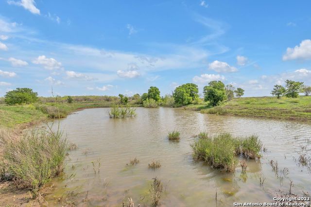 16547 East Gable Road St. Hedwig, TX 78152 - Photo 38 of 38 a view of a lake with a lake