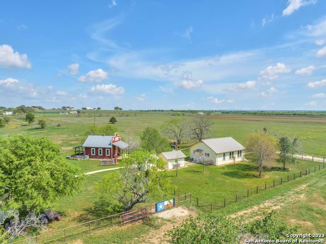 16547 East Gable Road St. Hedwig, TX 78152 - Photo 5 of 38 a view of a lake with houses in the back