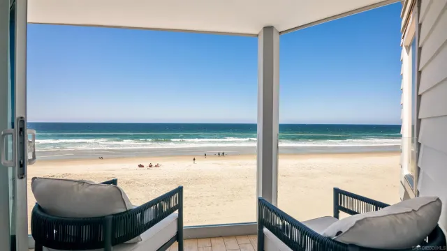 a view of a kitchen from the hallway