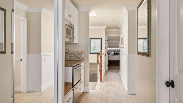 a bathroom with a sink vanity and a mirror