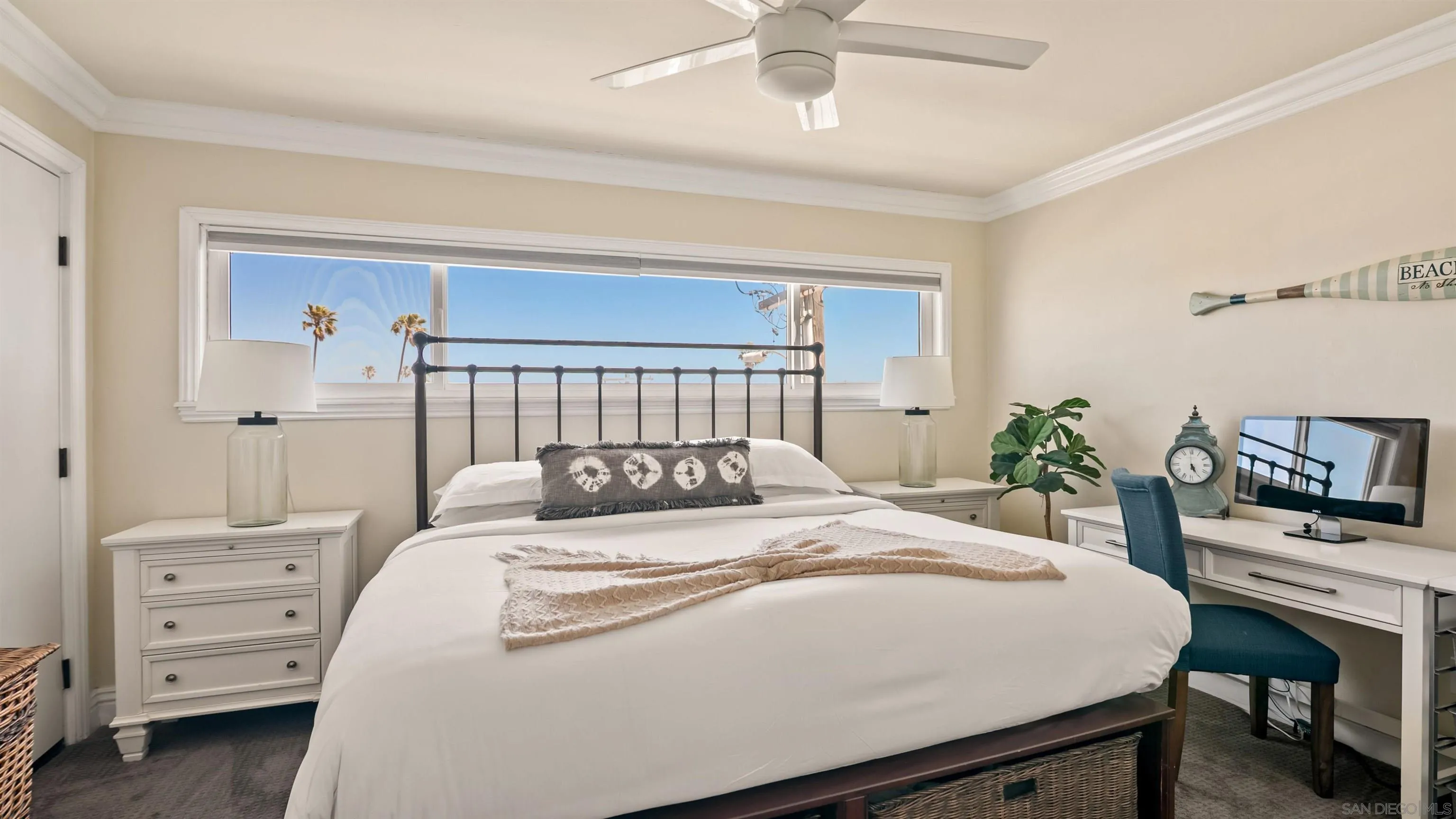 3285 Ocean Front Walk, Unit 3 San Diego, CA 92109 - Photo 28 of 38 a bedroom with a bed and a dresser