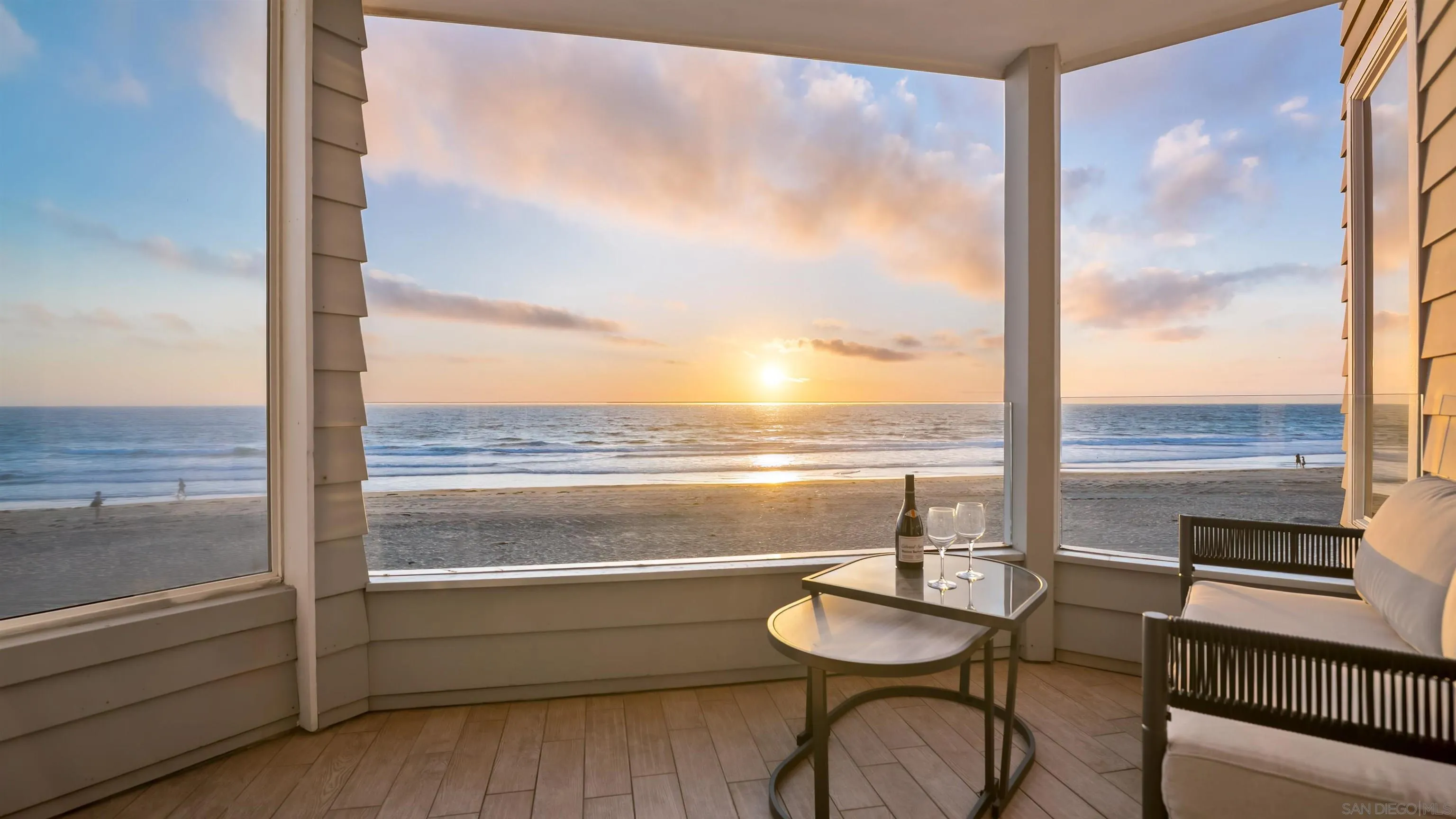 3285 Ocean Front Walk, Unit 3 San Diego, CA 92109 - Photo 32 of 38 a view of a balcony with furniture and floor to ceiling window