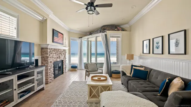 a bedroom with a bed and a large mirror