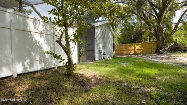 a view of backyard with green space