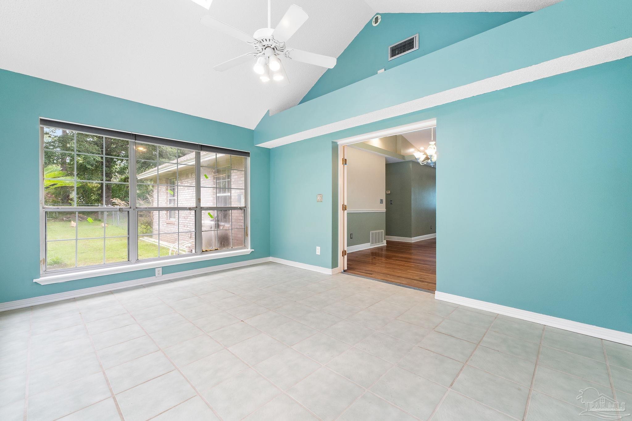 5645 Windham Road Milton, FL 32570 - Photo 16 of 40 a view of an empty room with a window