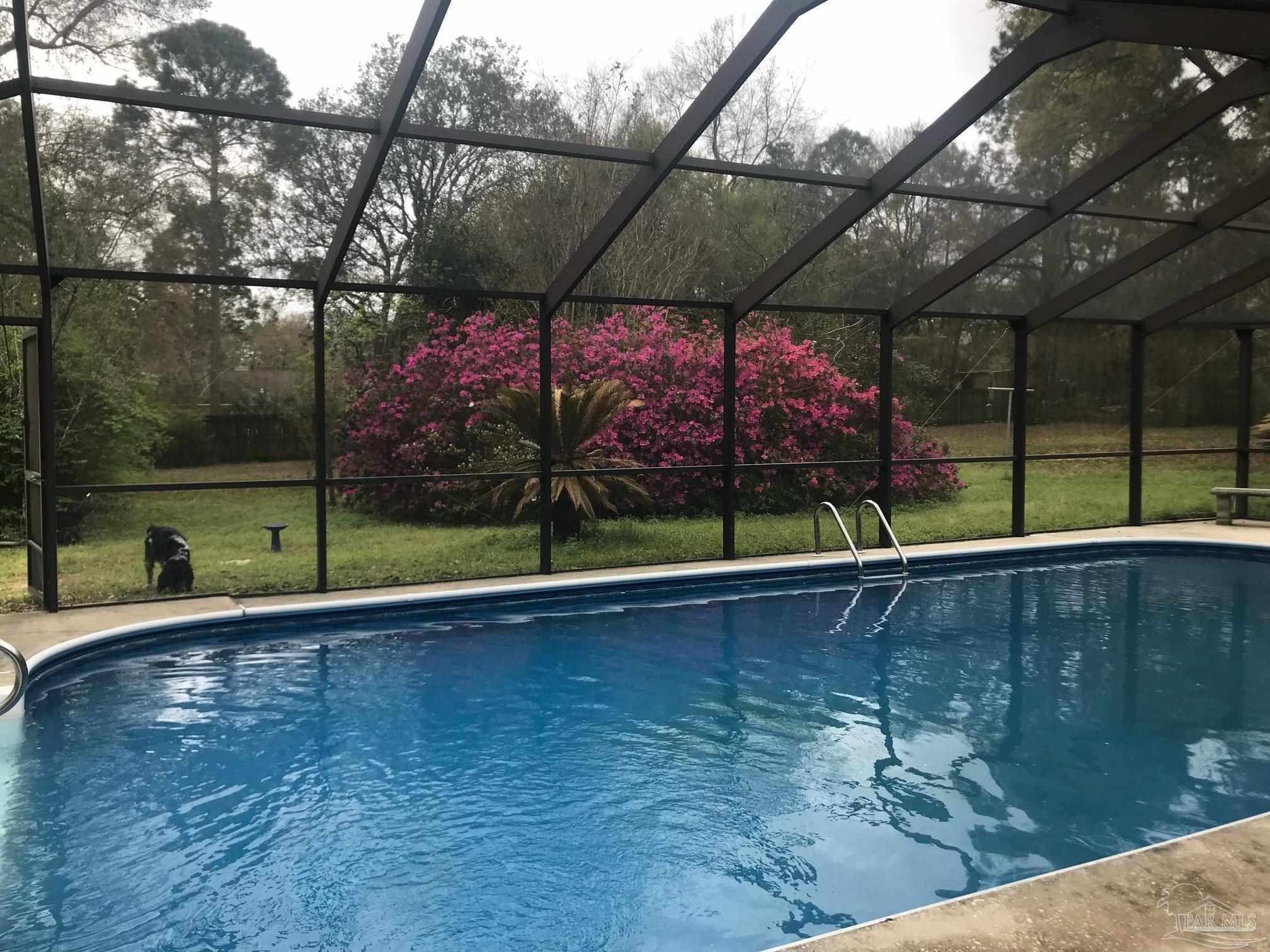 5645 Windham Road Milton, FL 32570 - Photo 39 of 40 a view of a backyard