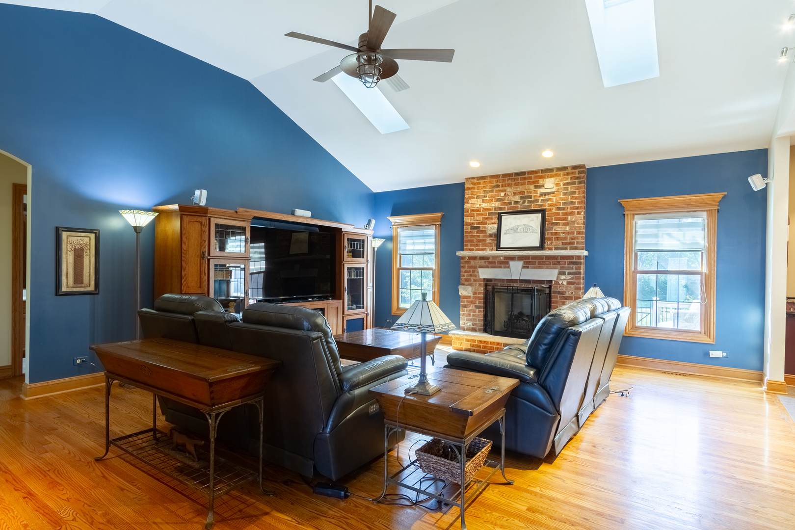 285 Valley Way Burlington, IL 60109 - Photo 18 of 40 a living room with fireplace furniture and a flat screen tv