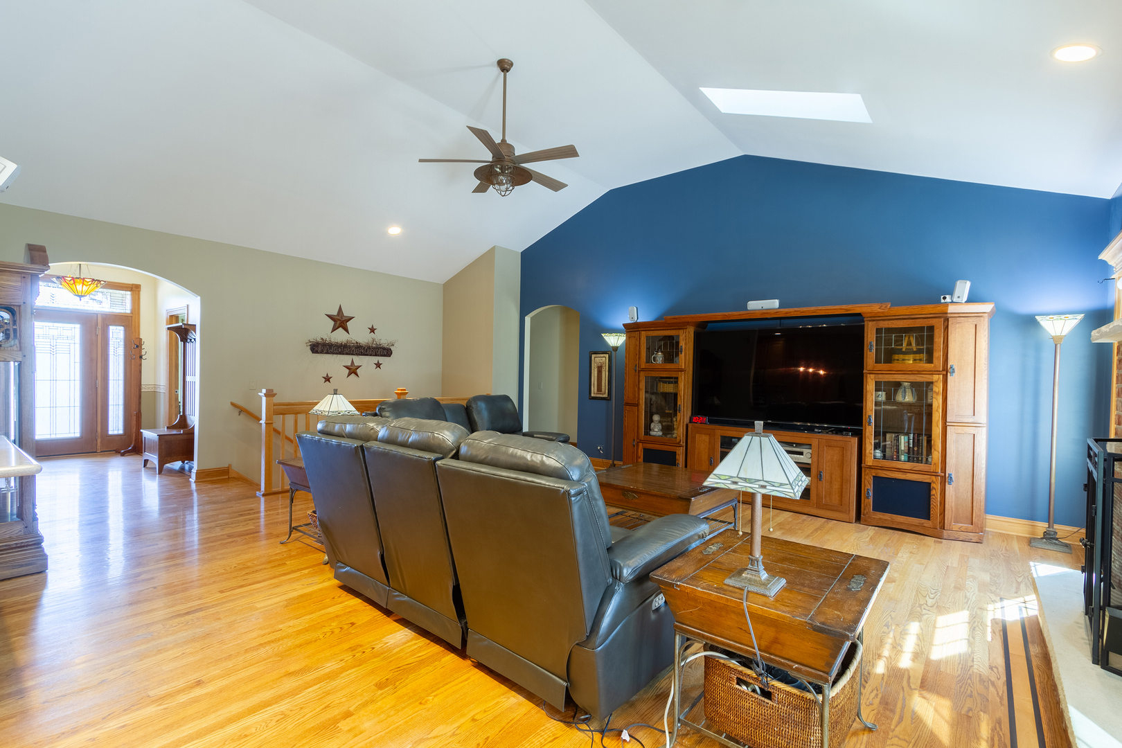 285 Valley Way Burlington, IL 60109 - Photo 20 of 40 a living room with furniture a dining table and a rug