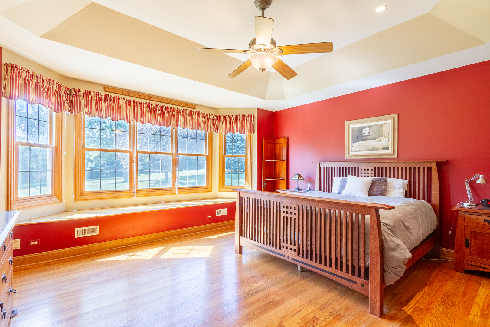 285 Valley Way Burlington, IL 60109 - Photo 22 of 40 a view of a bedroom with window and a ceiling fan
