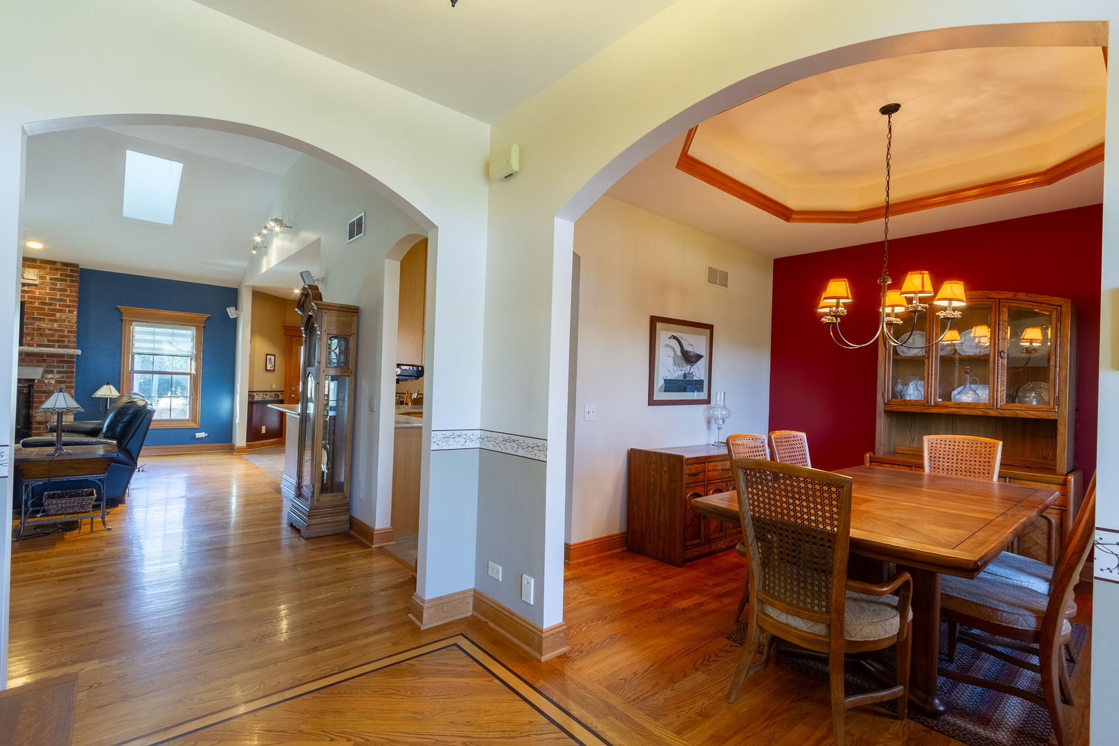 285 Valley Way Burlington, IL 60109 - Photo 7 of 40 a view of a dining room with furniture and wooden floor