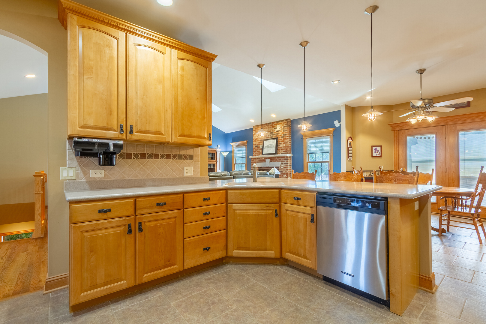 285 Valley Way Burlington, IL 60109 - Photo 9 of 40 a kitchen with stainless steel appliances granite countertop sink stove and cabinets