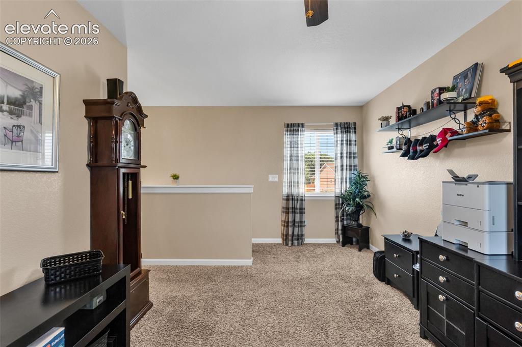 415 Empire Road Canon City, CO 81212 - Photo 27 of 40 a view of a livingroom with furniture and window