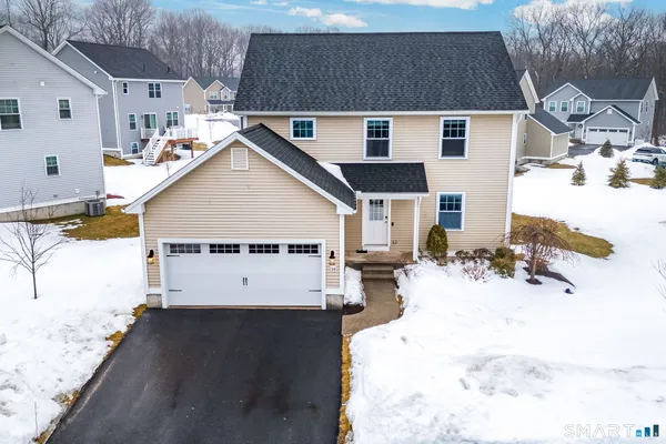a view of a back yard of the house