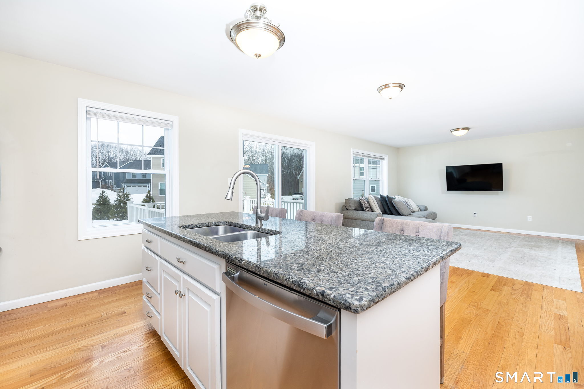 365 Allentown Road, Unit 34 Bristol, CT 06010 - Photo 12 of 43 a kitchen with granite countertop a sink and a counter top space