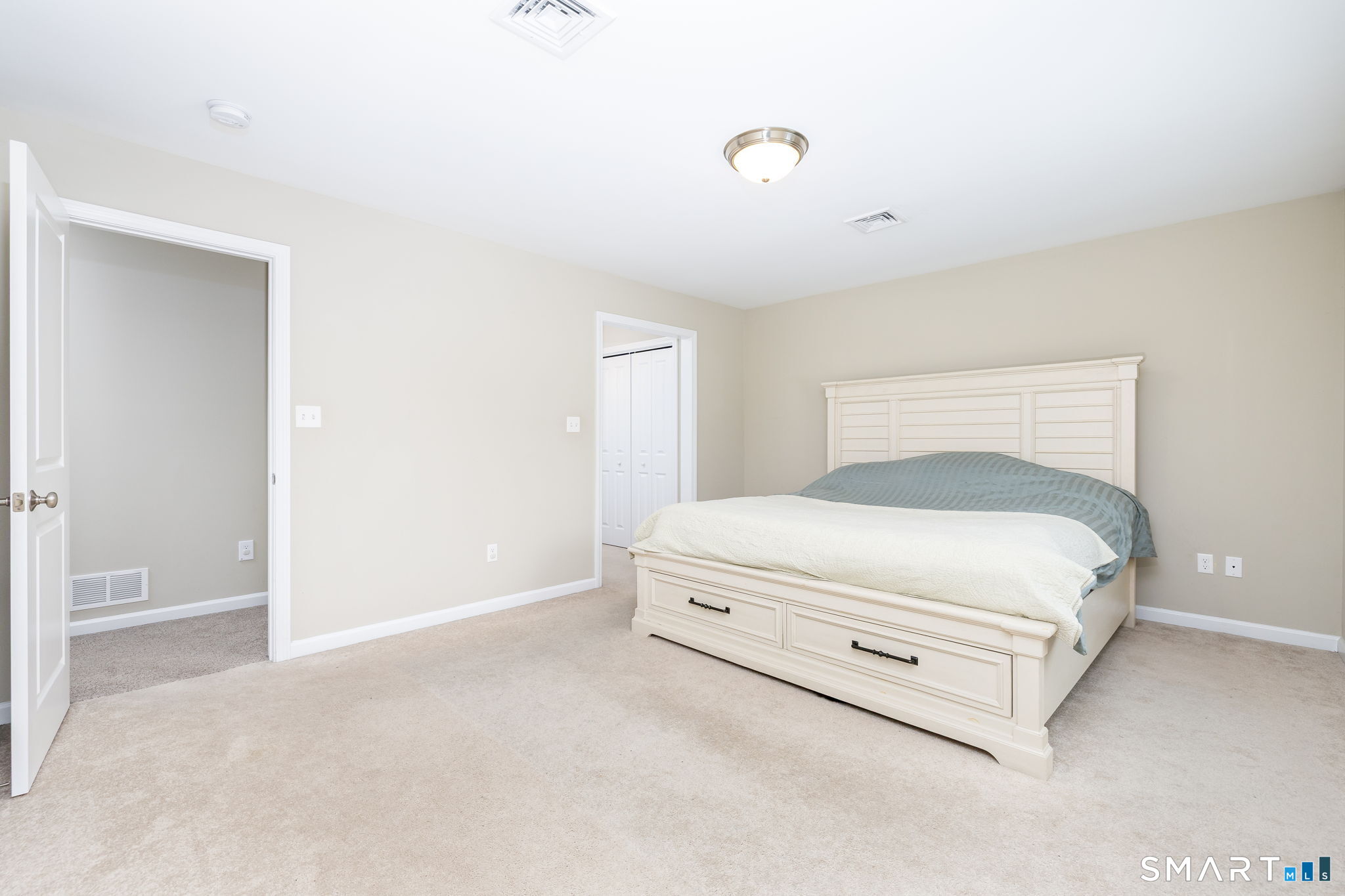 365 Allentown Road, Unit 34 Bristol, CT 06010 - Photo 22 of 43 a room with a bed and a night stand
