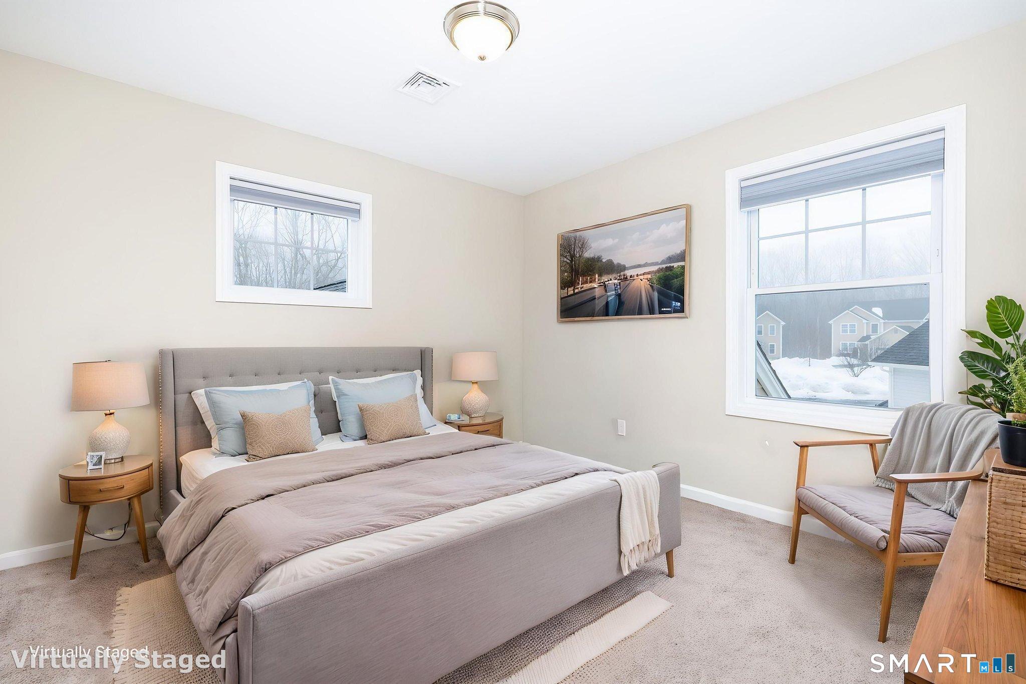 365 Allentown Road, Unit 34 Bristol, CT 06010 - Photo 23 of 43 a bedroom with a bed and a painting on the wall