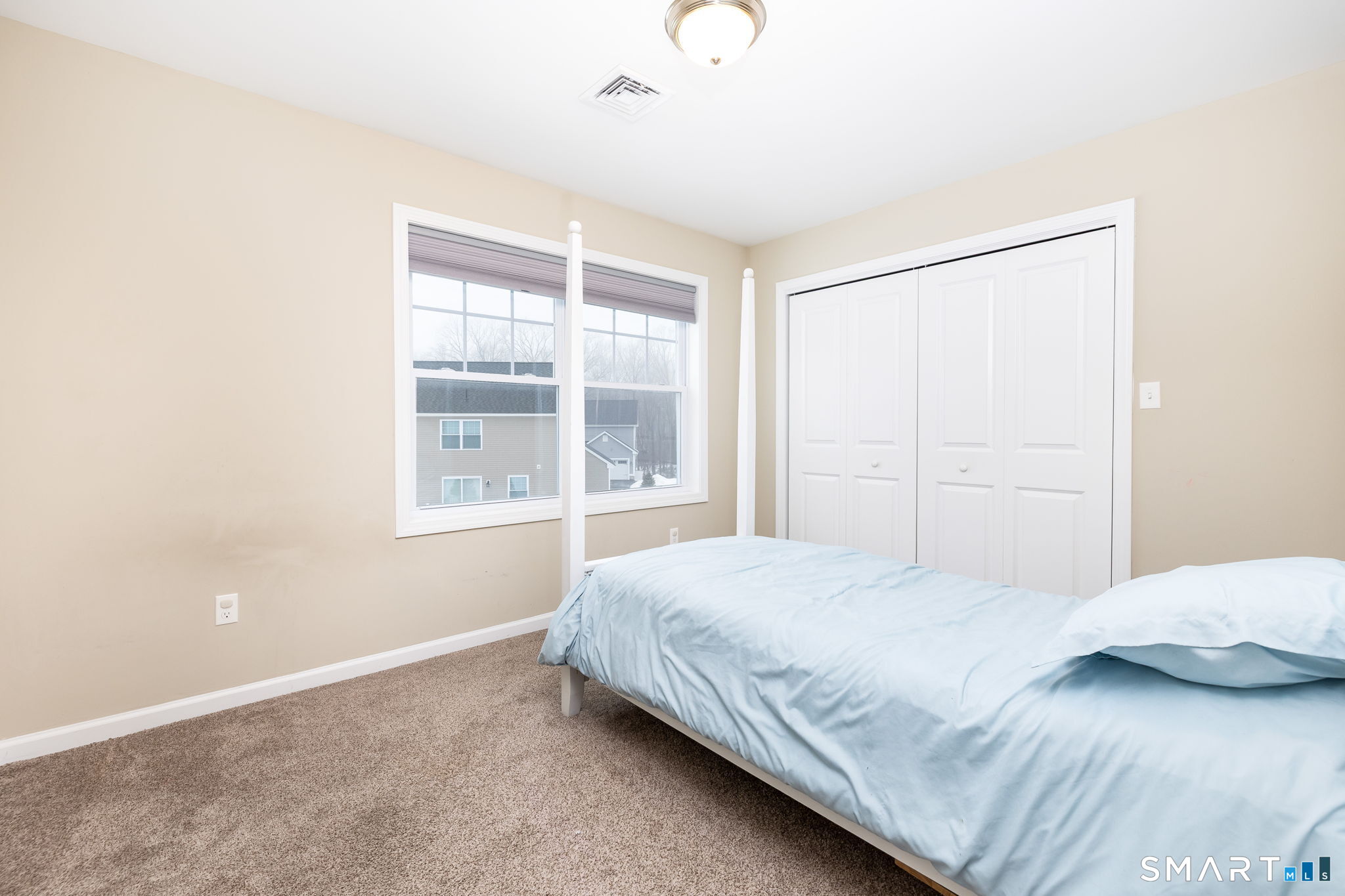 365 Allentown Road, Unit 34 Bristol, CT 06010 - Photo 29 of 43 a bedroom with a bed and a window