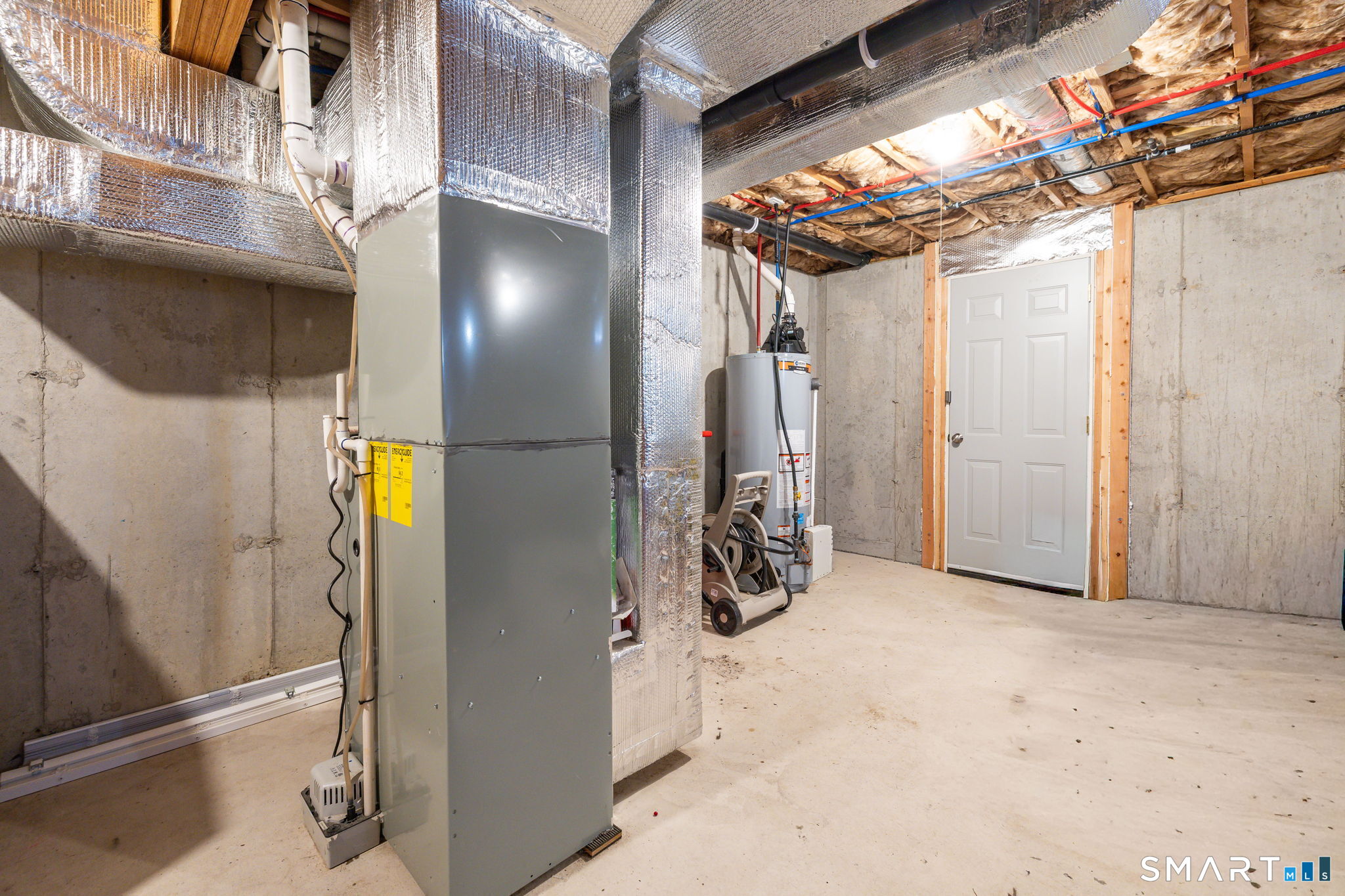 365 Allentown Road, Unit 34 Bristol, CT 06010 - Photo 34 of 43 a view of a storage room with a lot of stuff