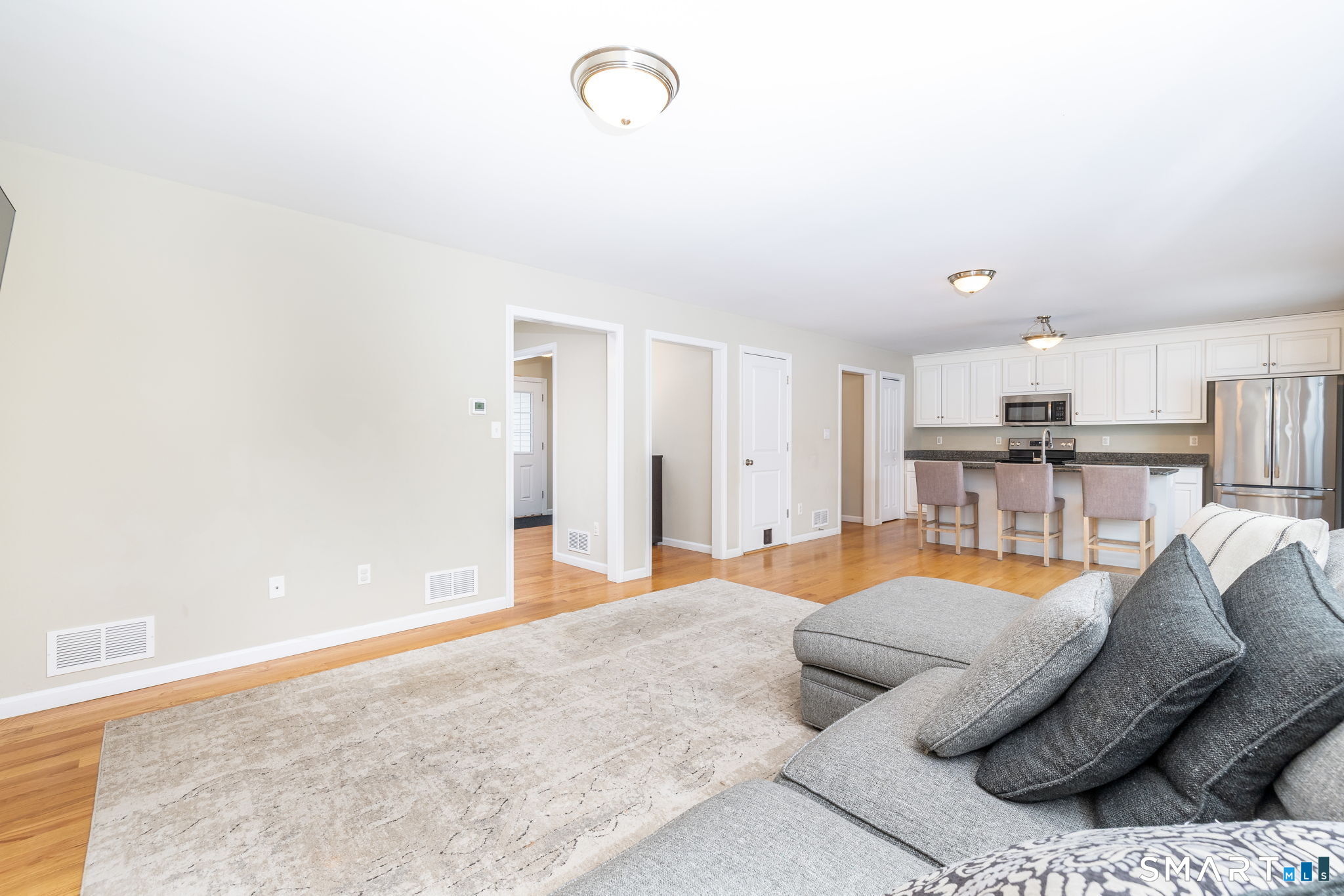365 Allentown Road, Unit 34 Bristol, CT 06010 - Photo 9 of 43 a living room with furniture and kitchen view