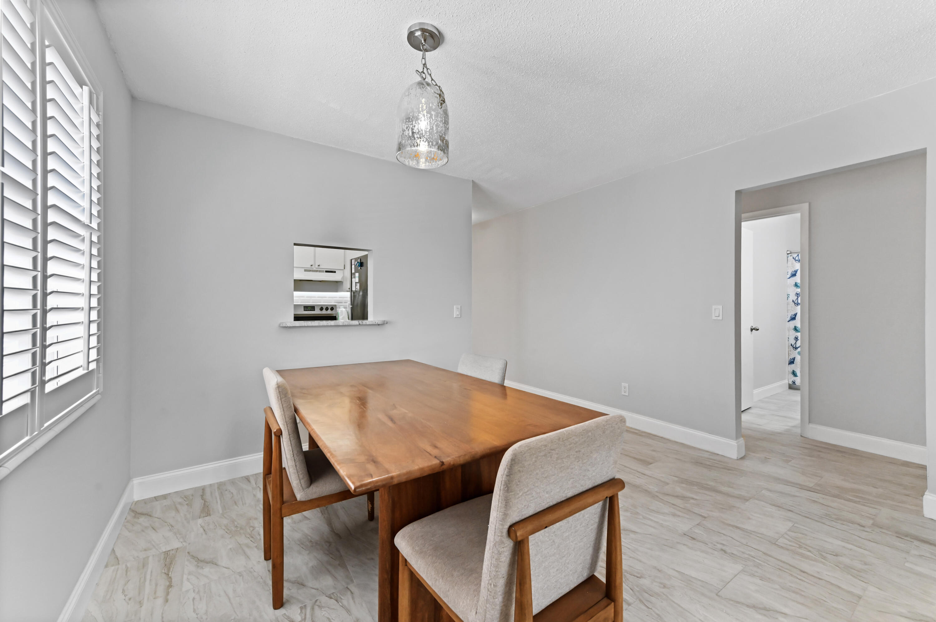2600 Southeast Ocean Boulevard, Unit AA8 Stuart, FL 34996 - Photo 5 of 36 09 Dining Room 02