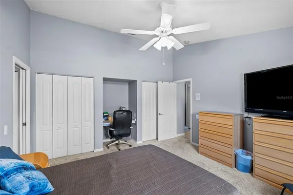 a view of a house with a swimming pool