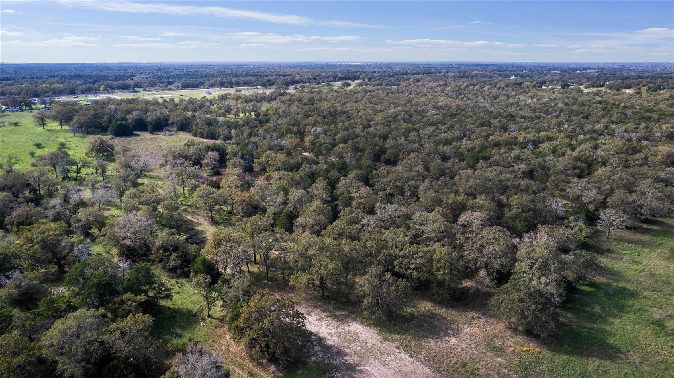 221 Old Waelder Road Flatonia, TX 78941 - Photo 16 of 27 an aerial view of a houses with a yard