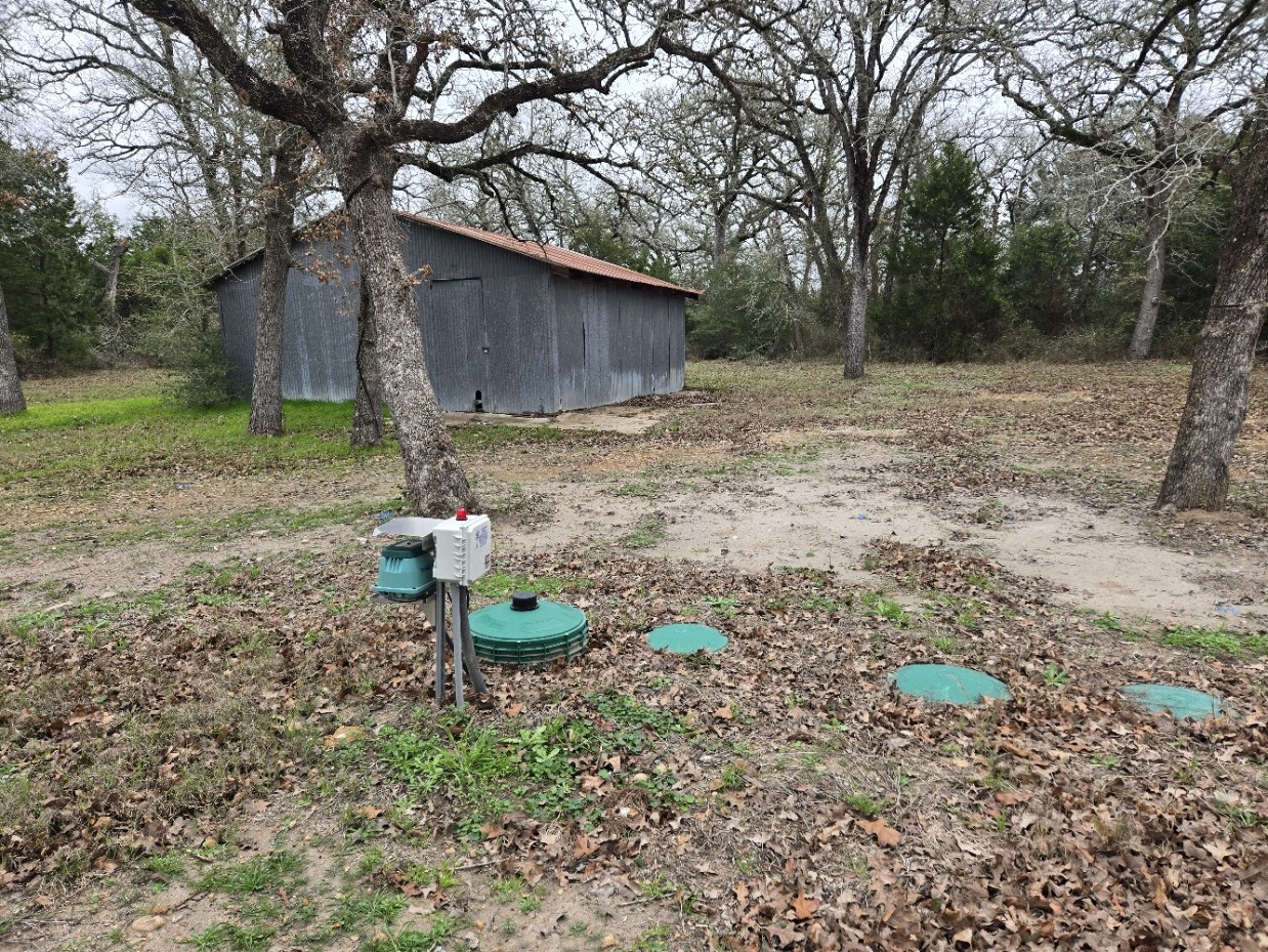 221 Old Waelder Road Flatonia, TX 78941 - Photo 26 of 27 a backyard of a house with seating space